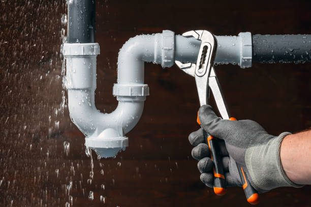 Professional Plumbing technician working in Bellport, NY